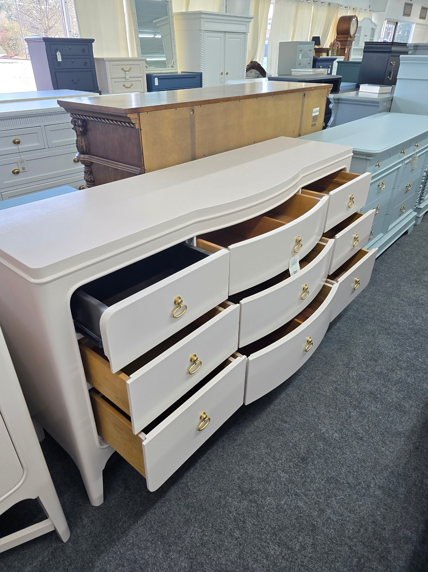 Universal soft pink lacquered dresser