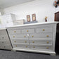 Light gray hexagon knobs dresser