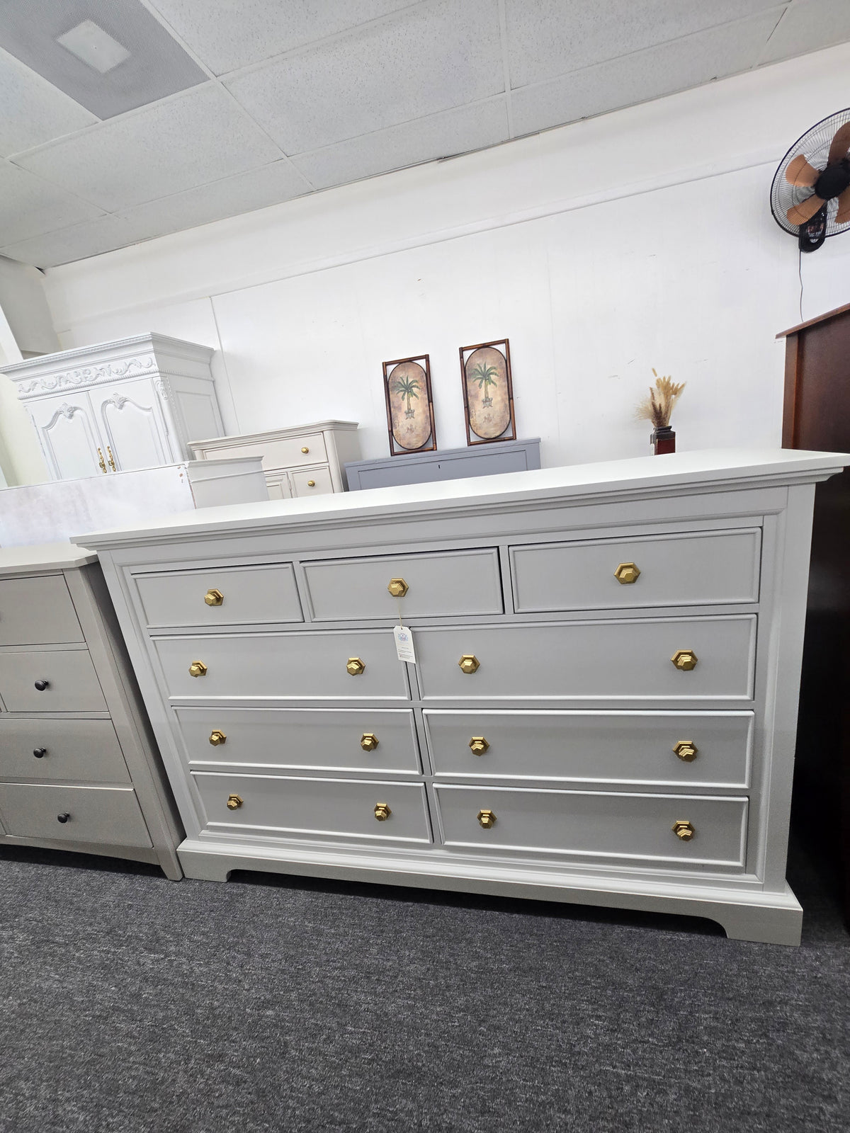 Light gray hexagon knobs dresser