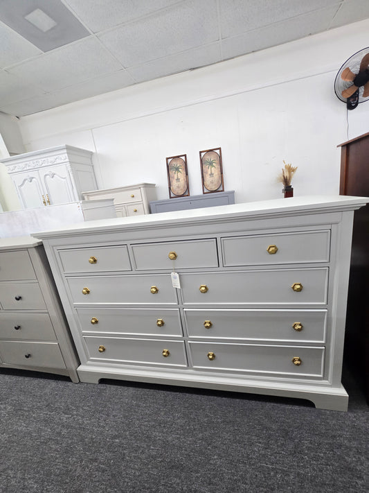 Light gray hexagon knobs dresser