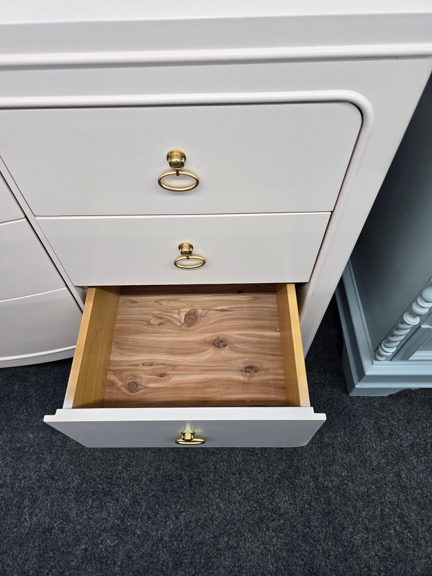 Universal soft pink lacquered dresser