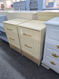 Beige pair of nightstands