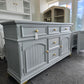 Gray dresser with golden legs