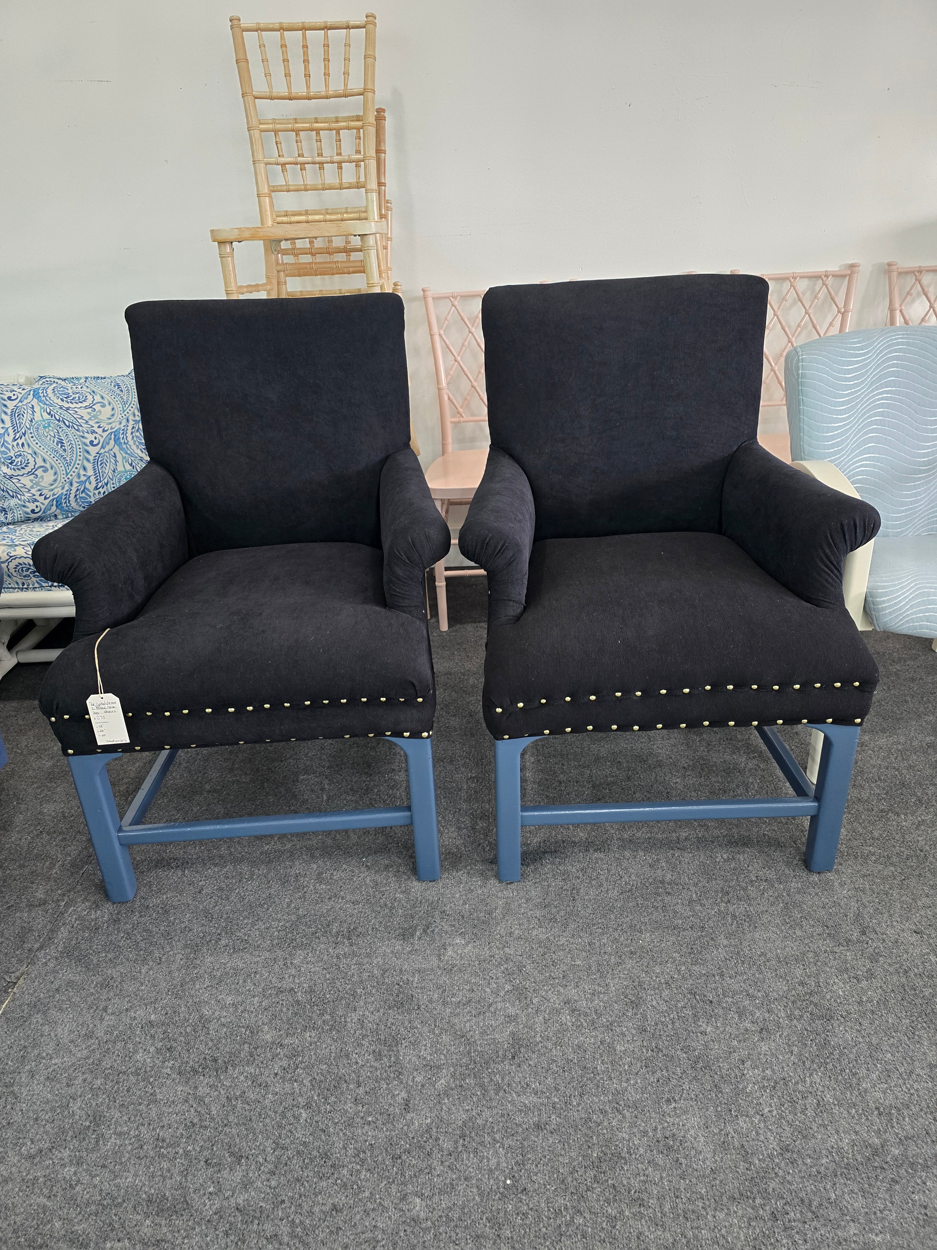2 upholstered black chairs