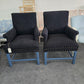 2 upholstered black chairs