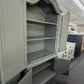 Pewter green carved armoire