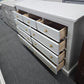 Light gray hexagon knobs dresser