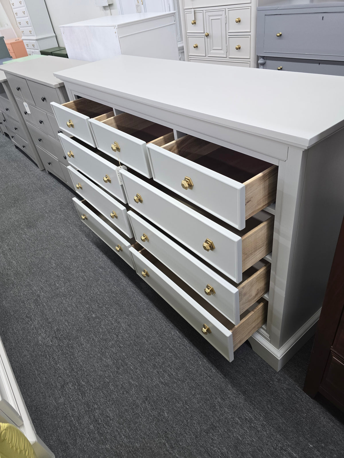 Light gray hexagon knobs dresser