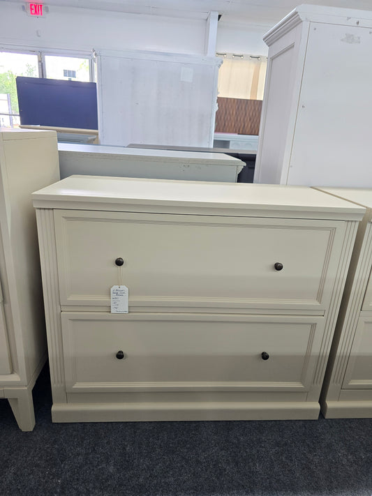2 doors beige small dresser