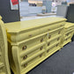 Cute soft yellow carved dresser