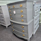 Solid wood bowfront gray greenish chest