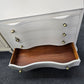 Antique beige secretary chest