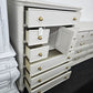 Cream tall 8 drawers 1 door chest
