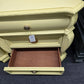 Cute carved soft yellow nightstand
