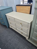 Solid wood Young Hinkle creamy dresser