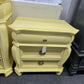 Cute carved soft yellow nightstand