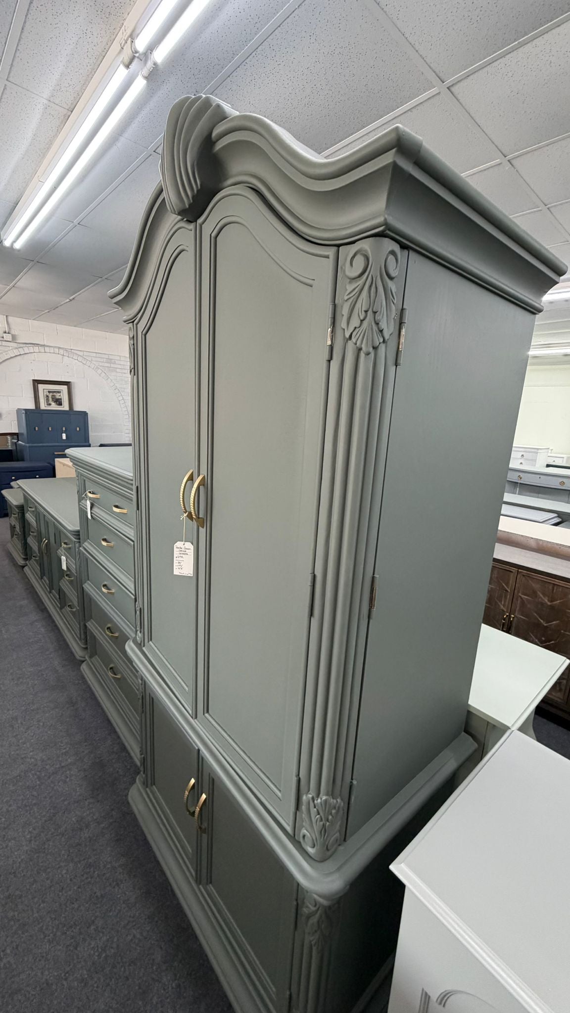 Pewter green carved armoire