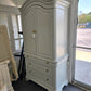 Gray tall armoire