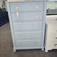 Teal chest with hexagonal knobs