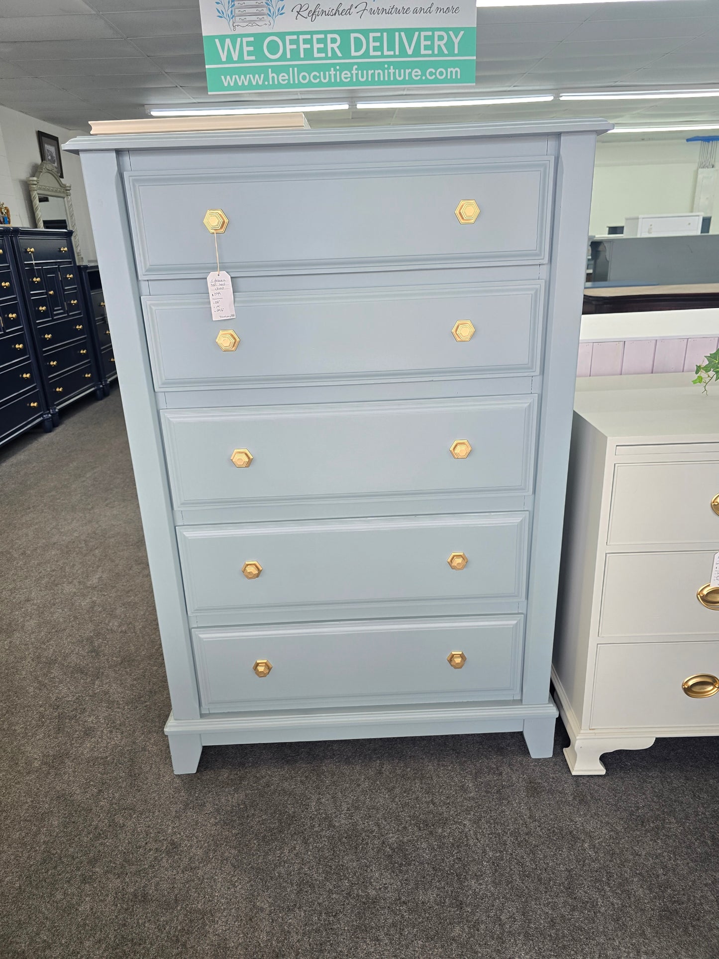 Teal chest with hexagonal knobs
