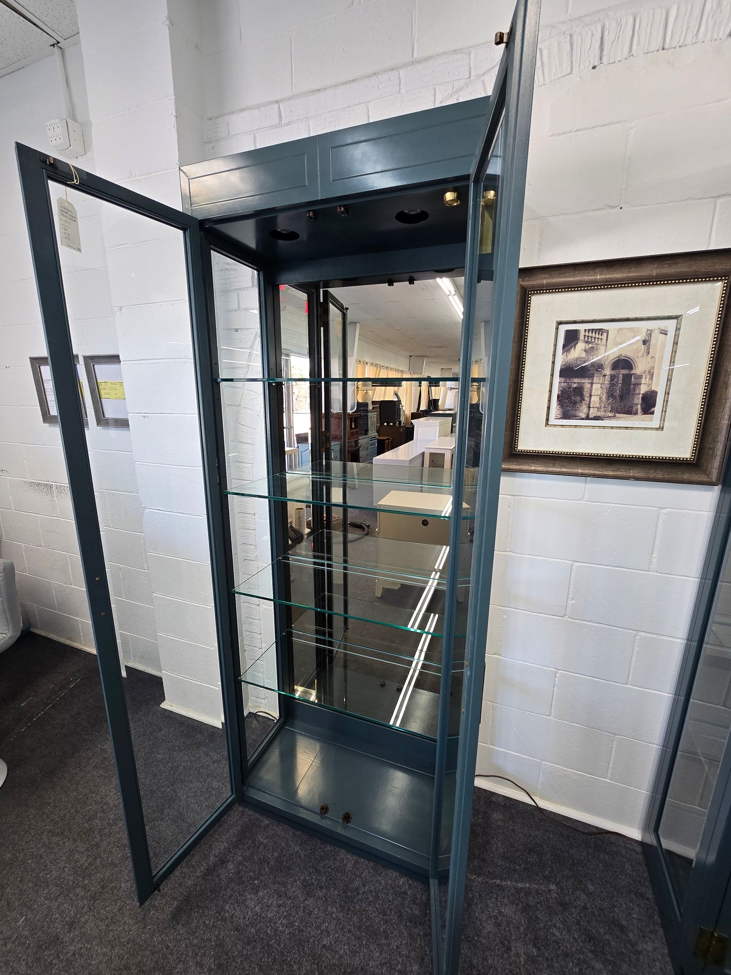 Green lacquered glass cabinet
