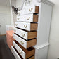 Vintage white lacquered bonnet chest
