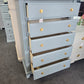 Teal chest with hexagonal knobs