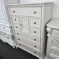 Cream tall 8 drawers 1 door chest