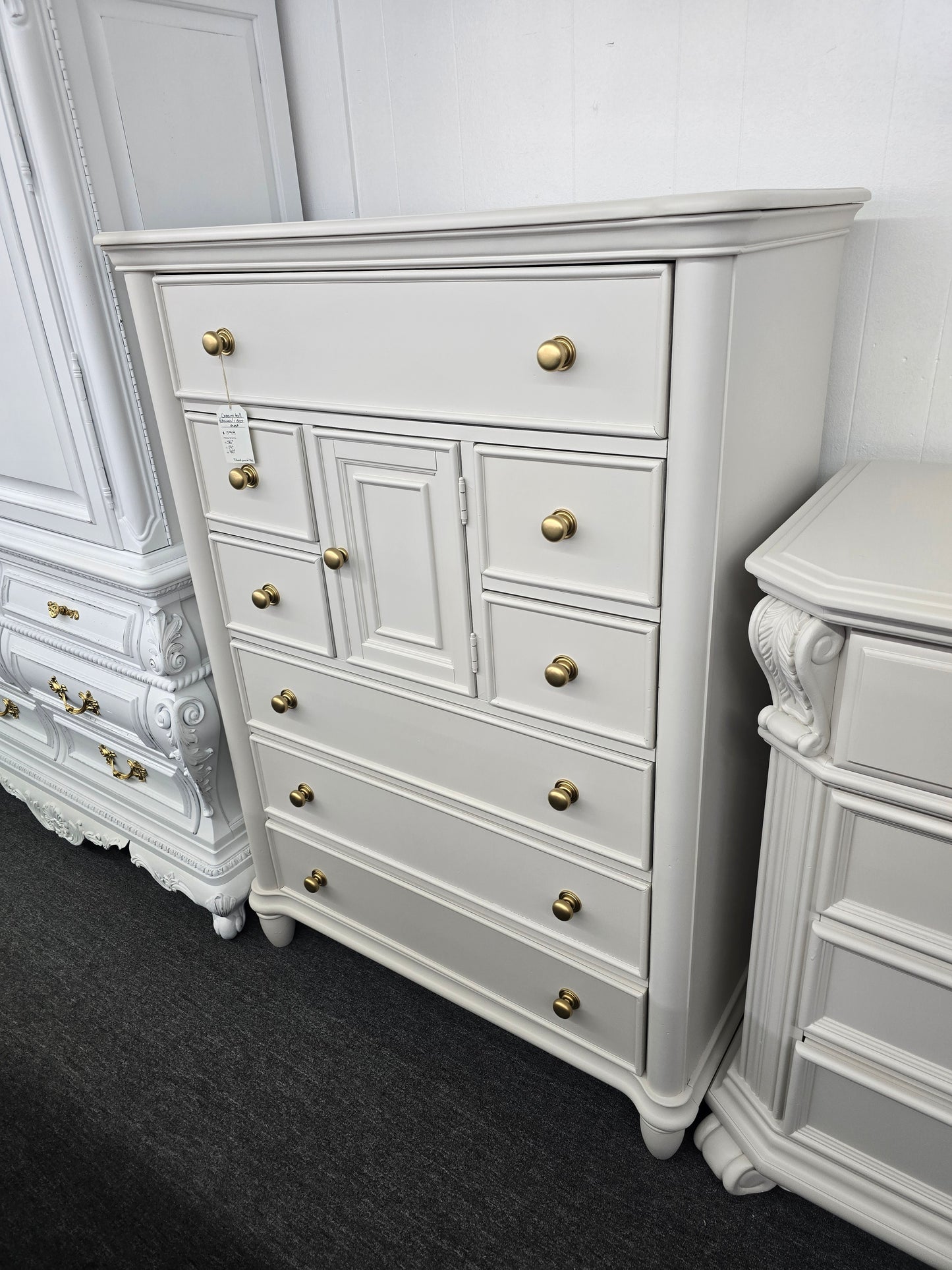 Cream tall 8 drawers 1 door chest