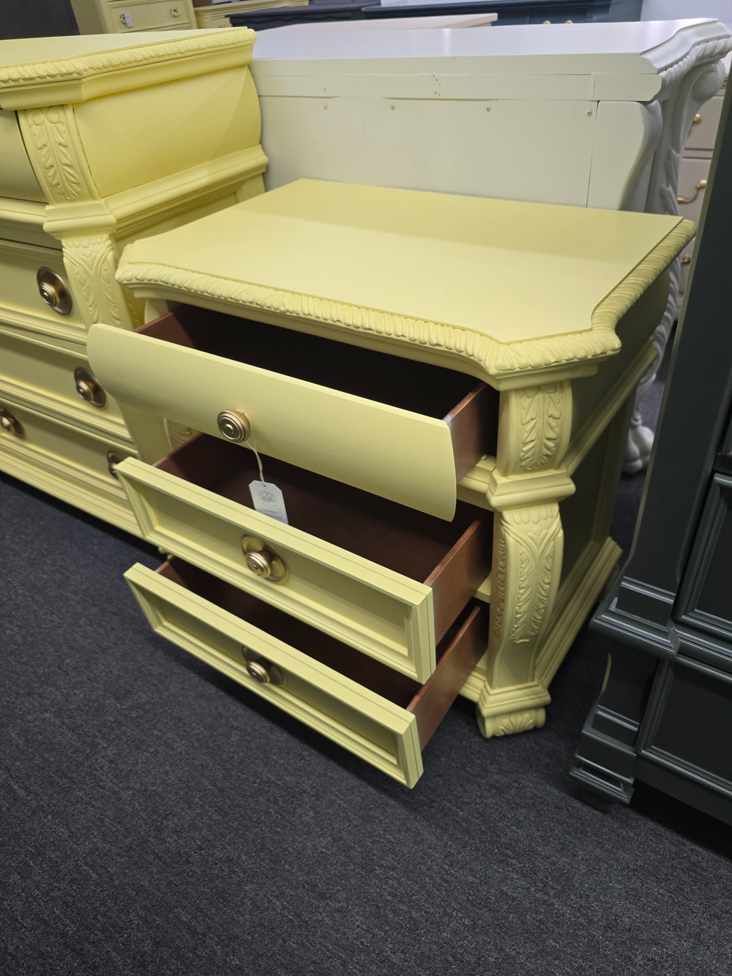 Cute carved soft yellow nightstand