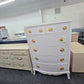 Bowfront pale pink chest
