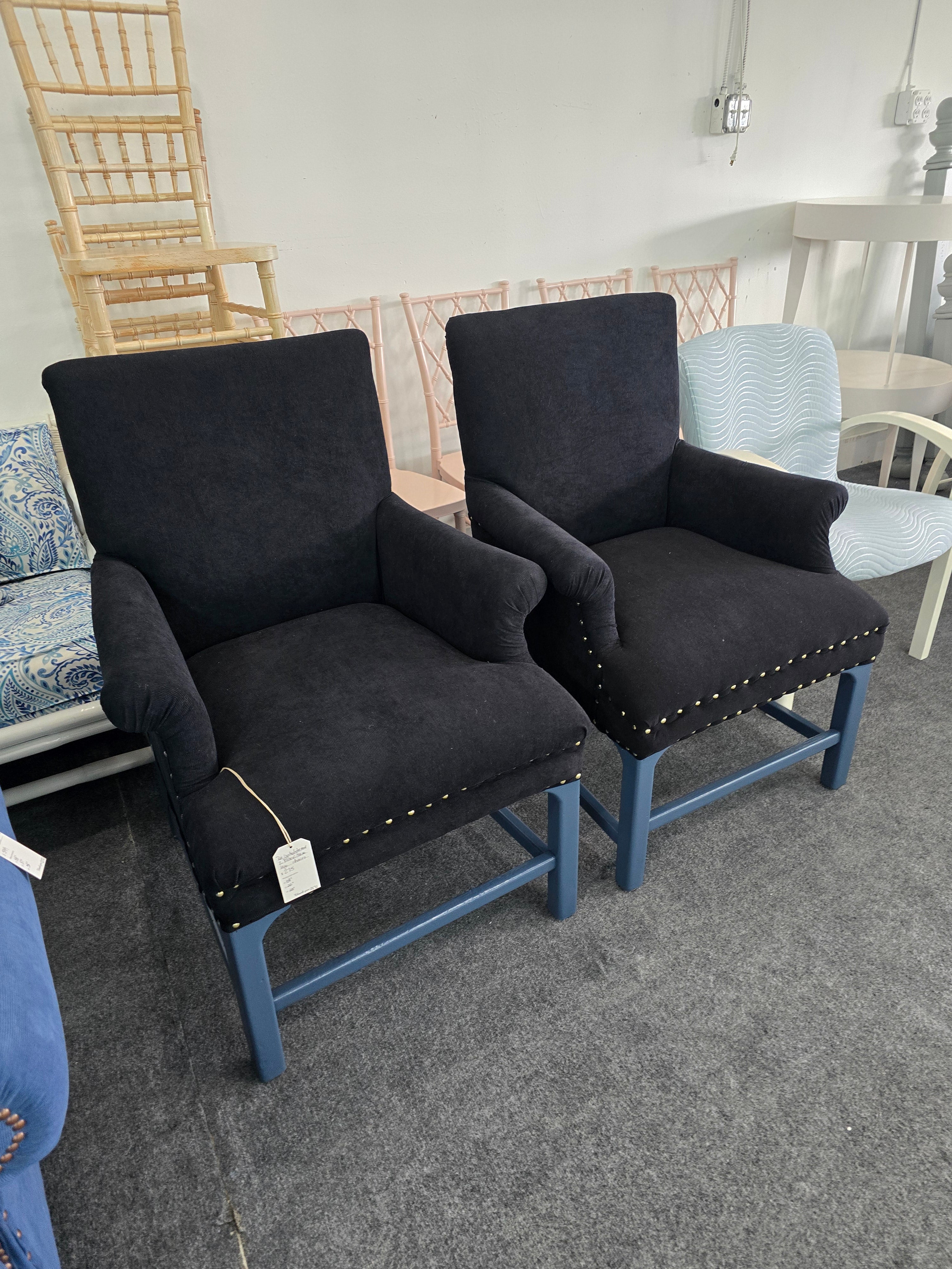 2 upholstered black chairs