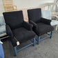 2 upholstered black chairs