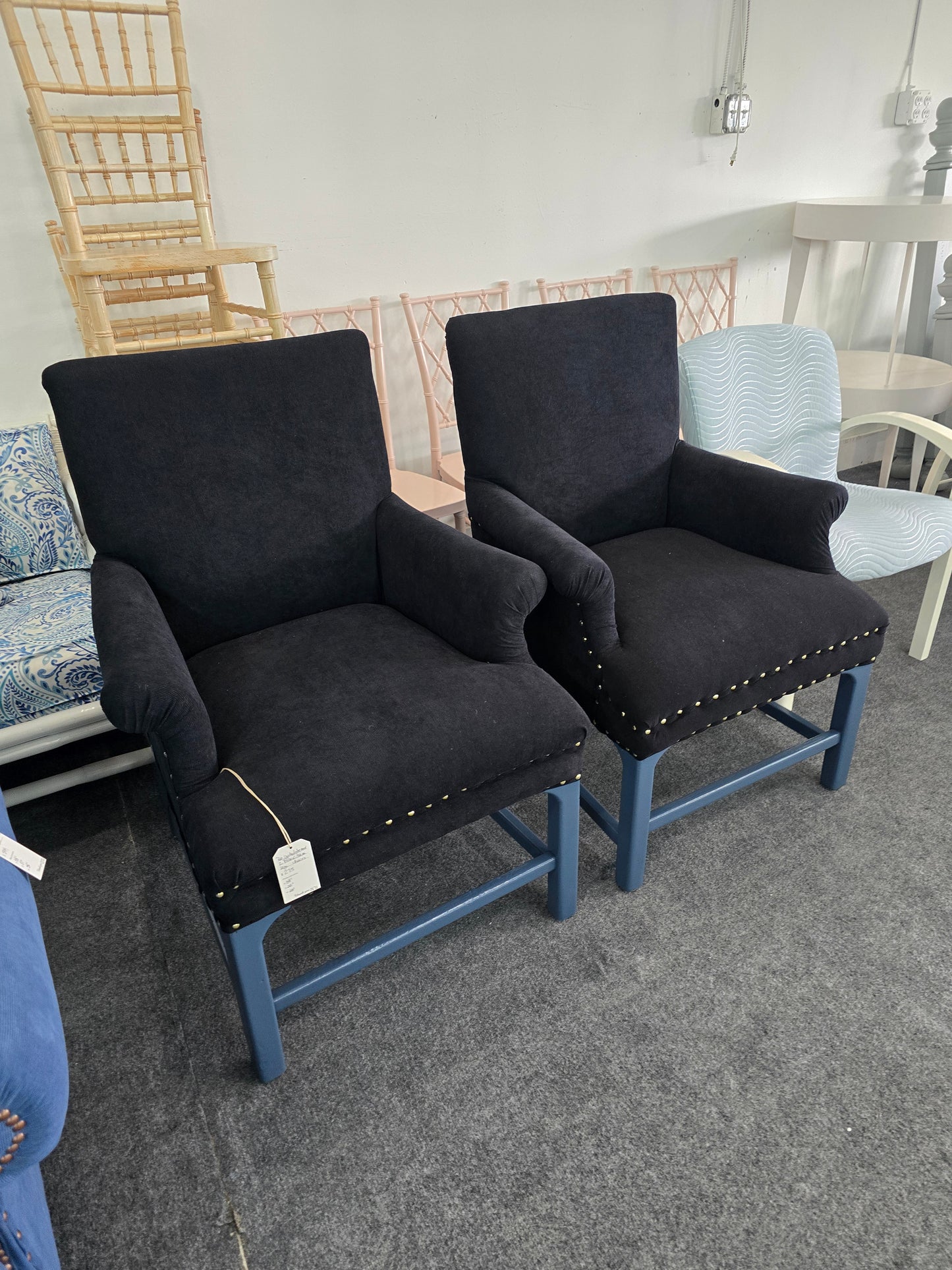 2 upholstered black chairs
