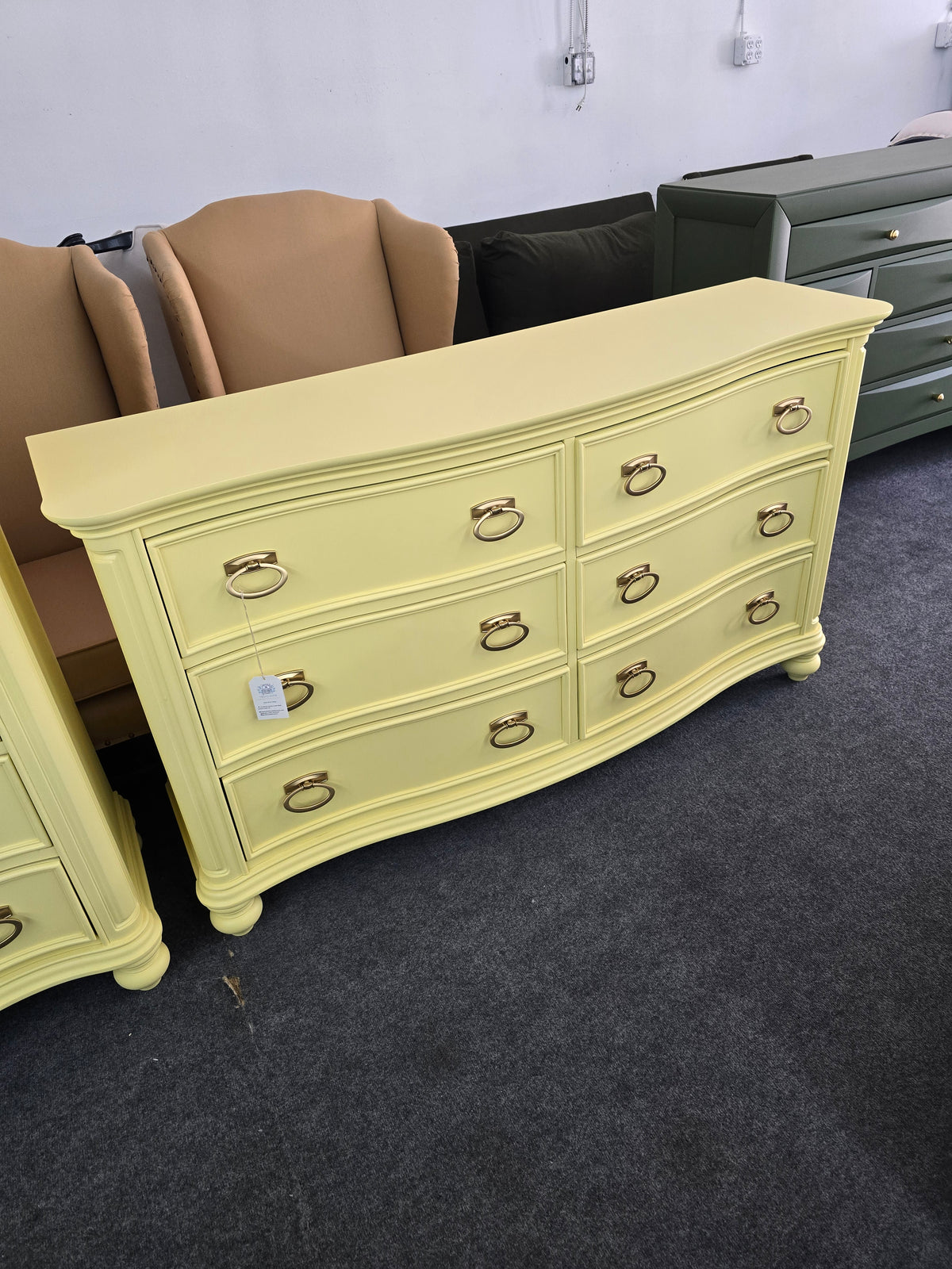 Soft yellow bowfront modern dresser
