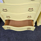 Bowfront yellow modern chest