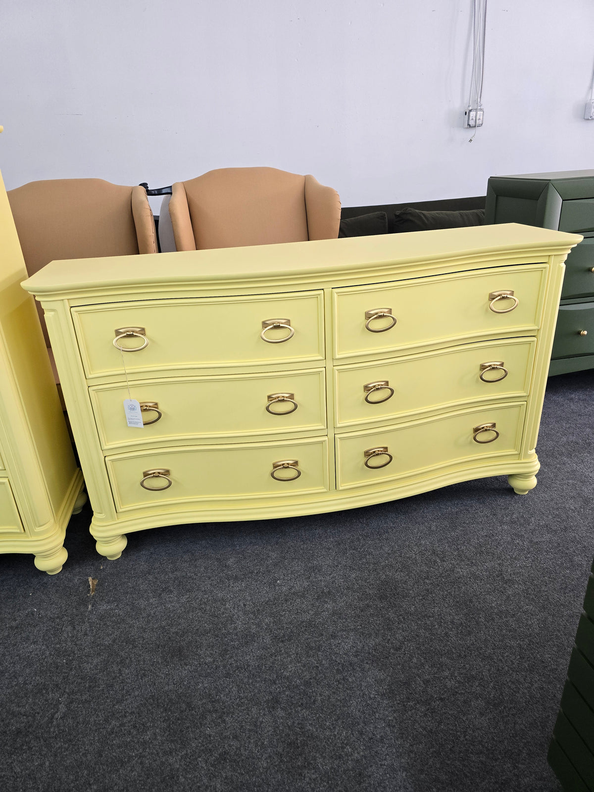Soft yellow bowfront modern dresser