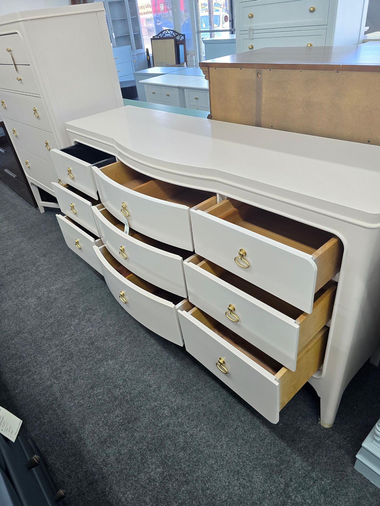 Universal soft pink lacquered dresser