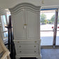 Gray tall armoire