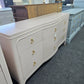 Universal soft pink lacquered dresser