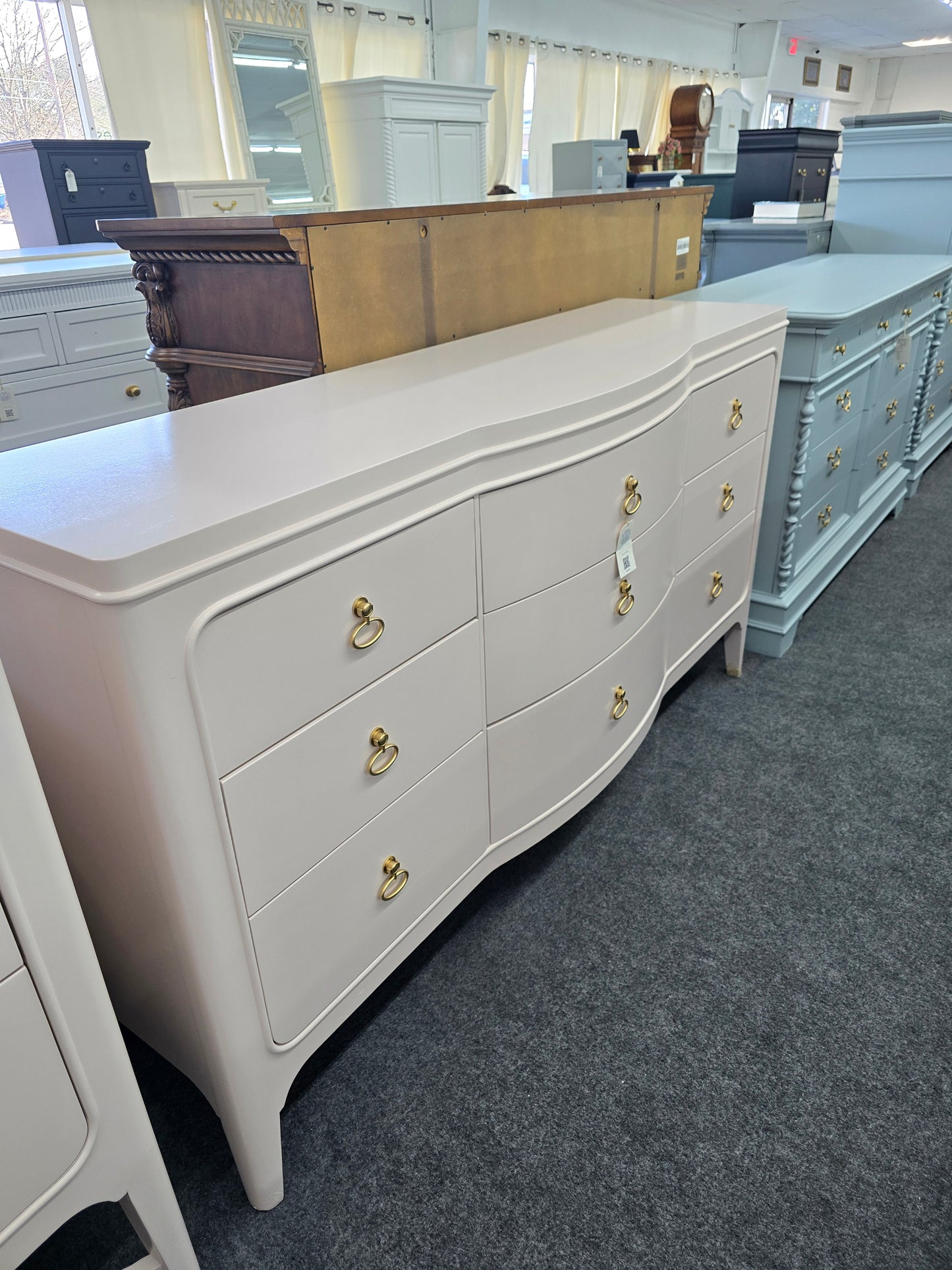 Universal soft pink lacquered dresser