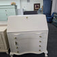 Antique beige secretary chest